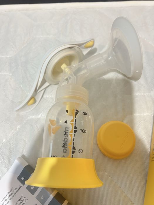 Помпа за кърма  Медела+ електричен комплект за бебета + Кенгуру