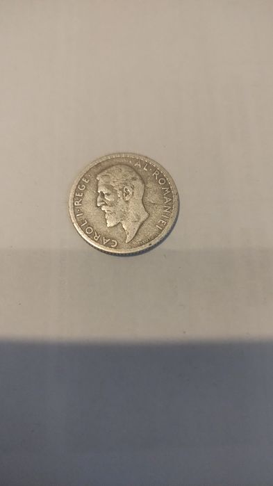 Vand monede 1 leu 1910 pret 300 leu si monede de 20 lei an 1993 cu stema Stefan cel mare pret 200 lei