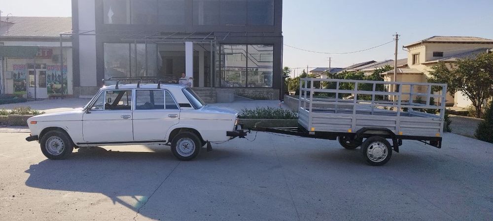 Автомабил сотилади зудлик билан прицепи бор охволи янги