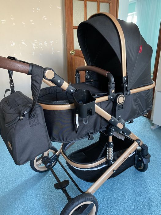 Продам коляску белеку черная