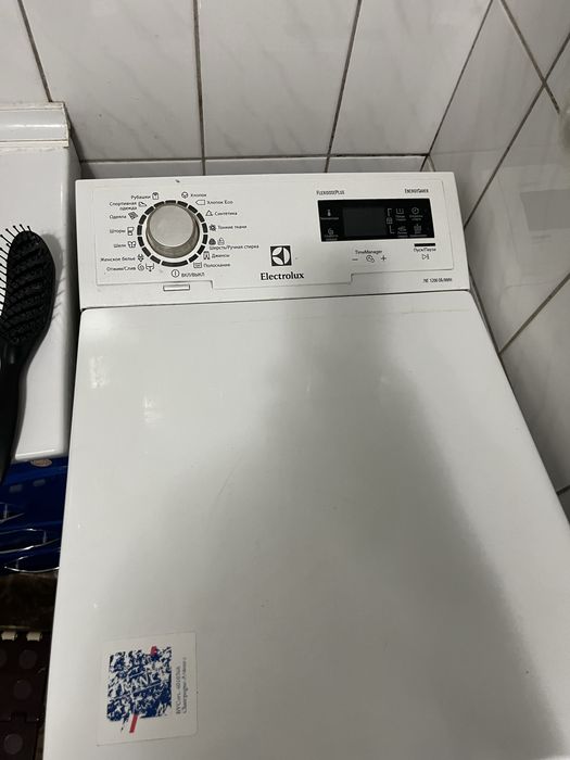 Машинка вертикальная electrolux