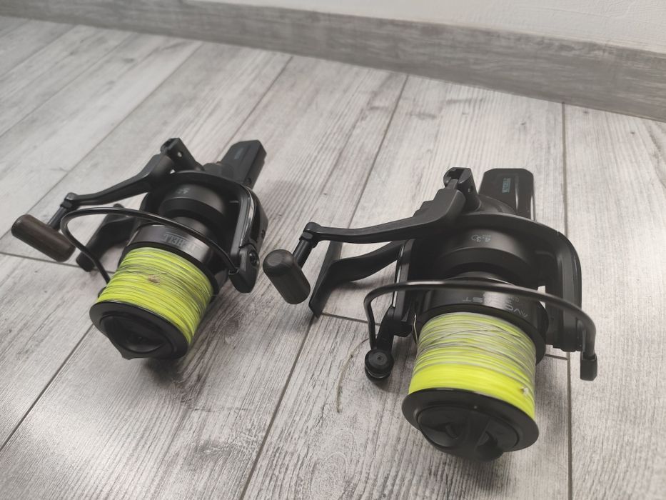 Vând mulinete Mitchell Avocast Black Edition 7000