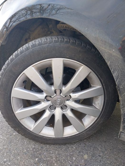 Jante R16 5x100 Originale Audi A1 + 215/45 R16 Allseason Continental