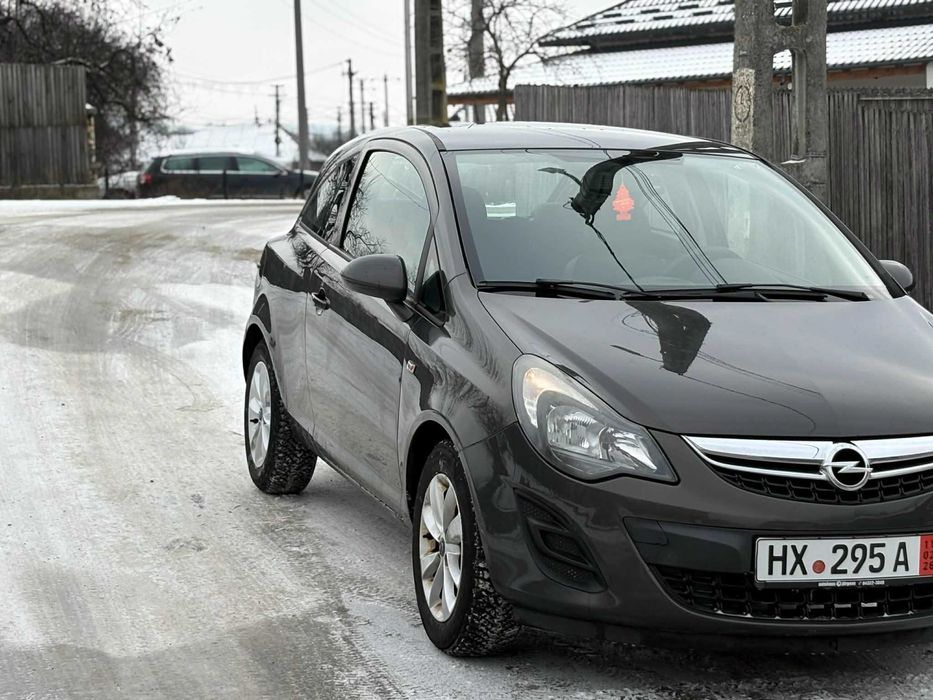 Opel corsa 2014 motor 1.2 benzina consum foarte mic