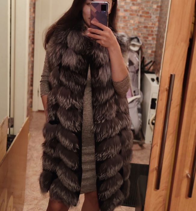 Продам меховую желетку
