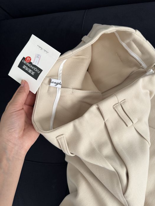 Теплые бежевые брюки