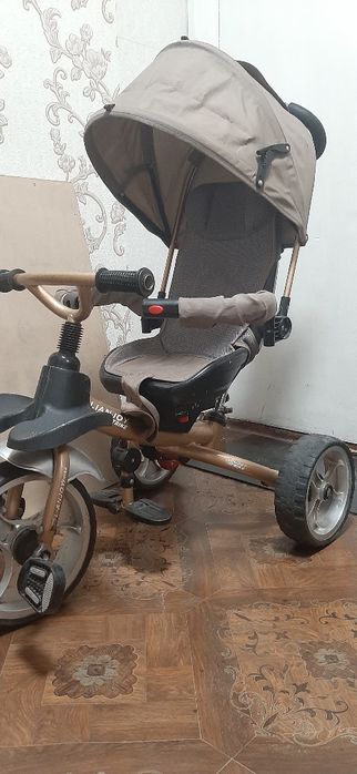 Велосипед с родительской ручкой.