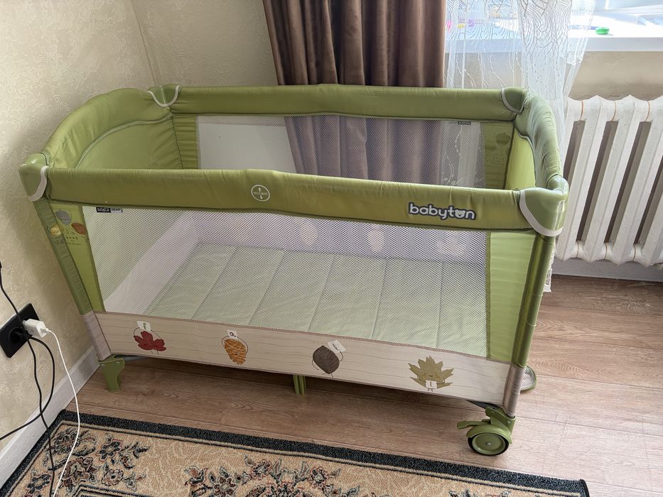 Продам манеж babyton