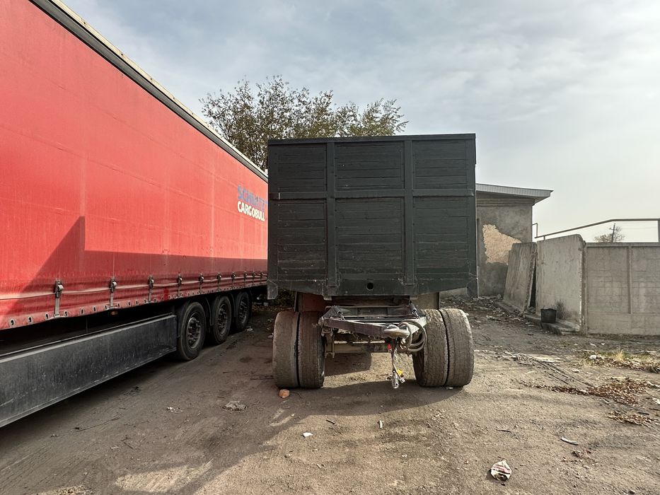 КАМАЗ с трехсоным прицепом