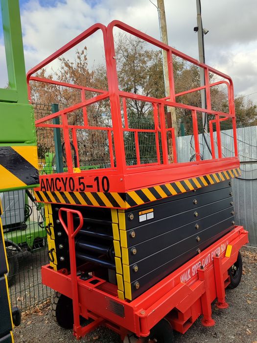 Продам ножничный подъемник