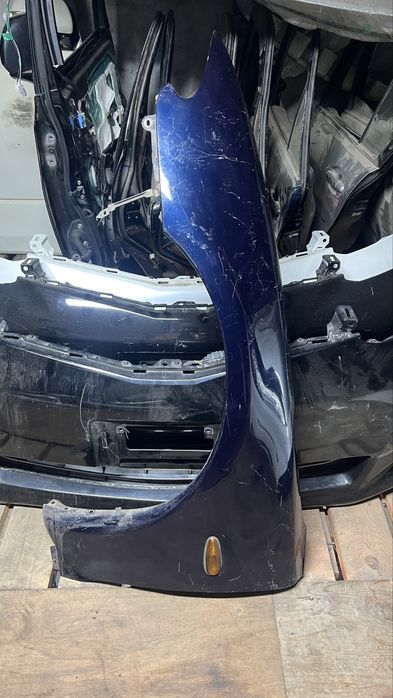 Левое крыло  Мазда Кседокс 6