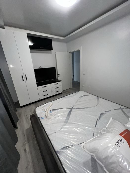 Propietar  doua camere decomandat  cu loc de parcare  si centrala