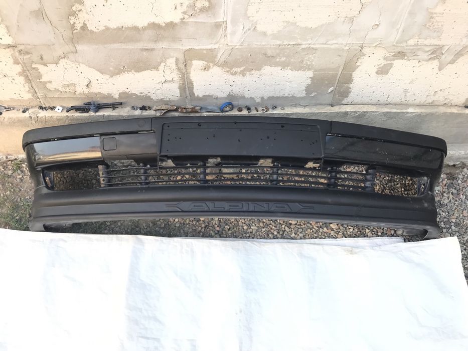 Бампера BMW E38 фары