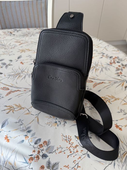 стильная мужская сумка-барсетка.