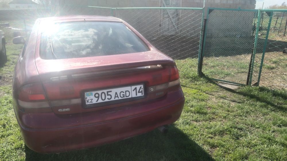 Мазда кронос хечбек