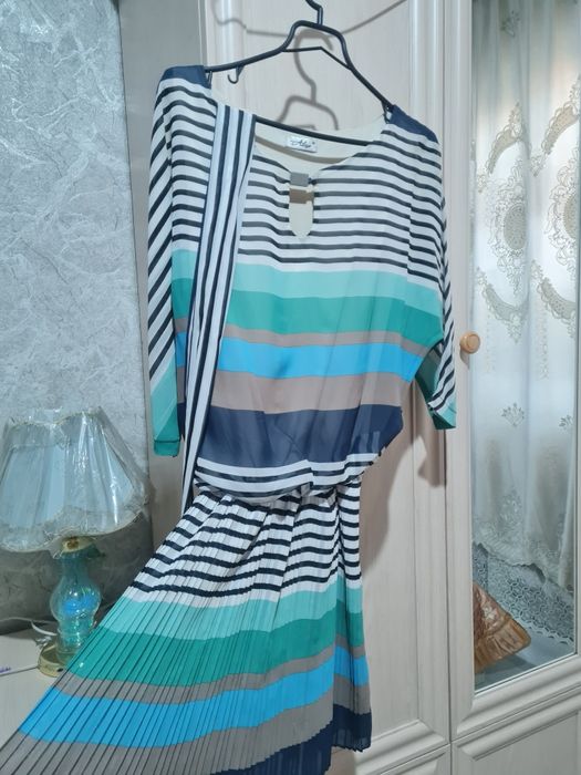 Платья и кофточки