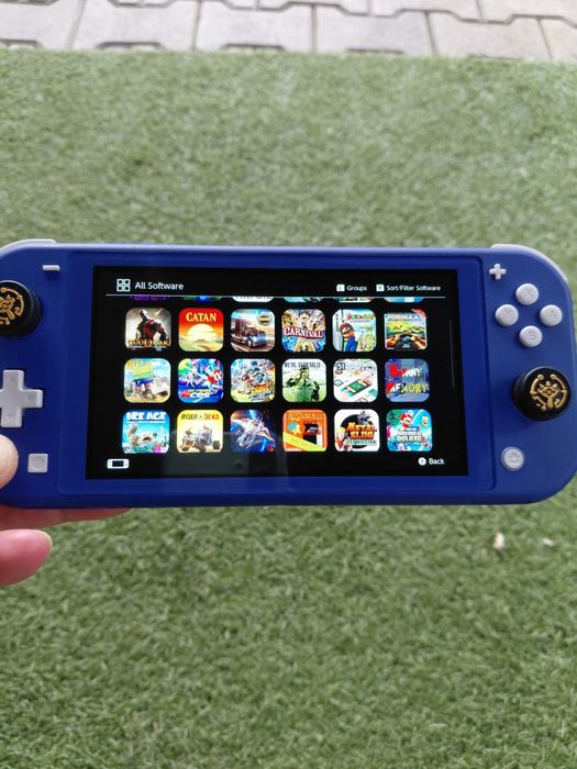 Nintedo Switch Lite modat cu cip raspberry pi 2040 si card de 128 Gb