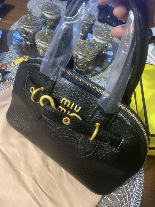 Geanta noua, Miu Miu