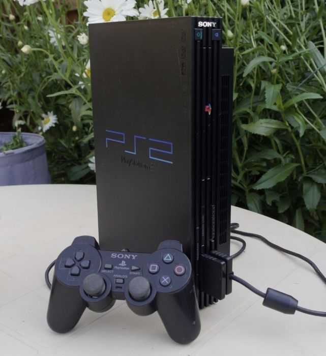 Playstation 2 + volan+ jocuri