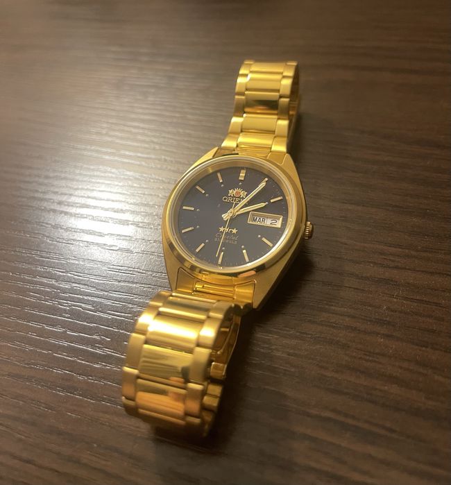 Orient Tristar часы