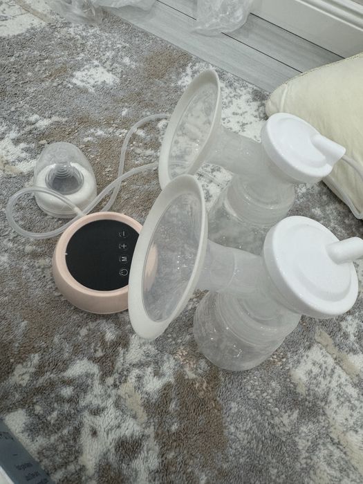 Молокоотсос электрический новый