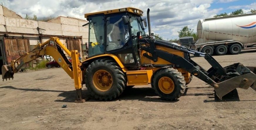Продаю экскаватор-погрузчик CAT432D
