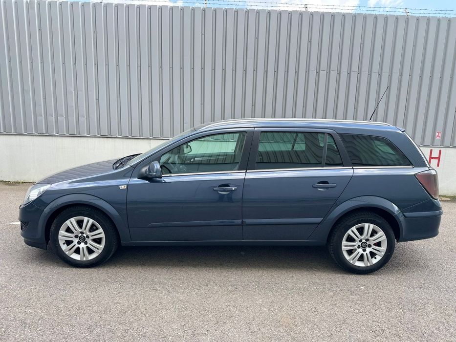 Opel astra h an 2009 al doilea proprietar