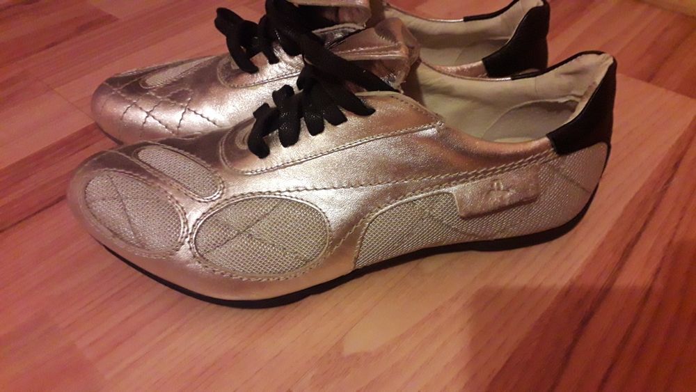 Adidasi puma Rudolf Dassler tenis de camp