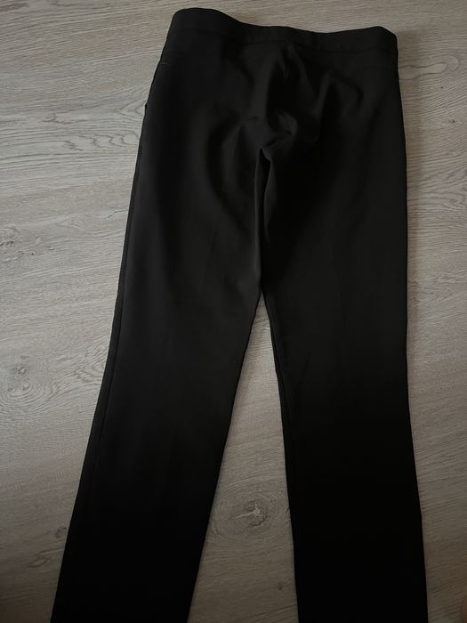 Pantaloni eleganti conici