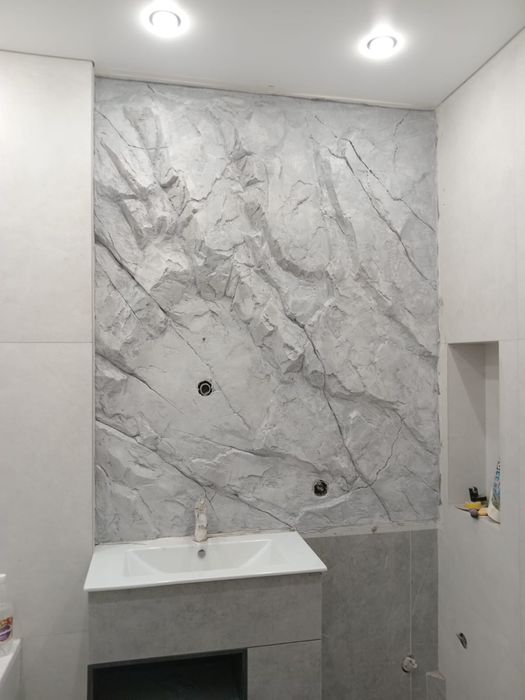 Барельефы скалы