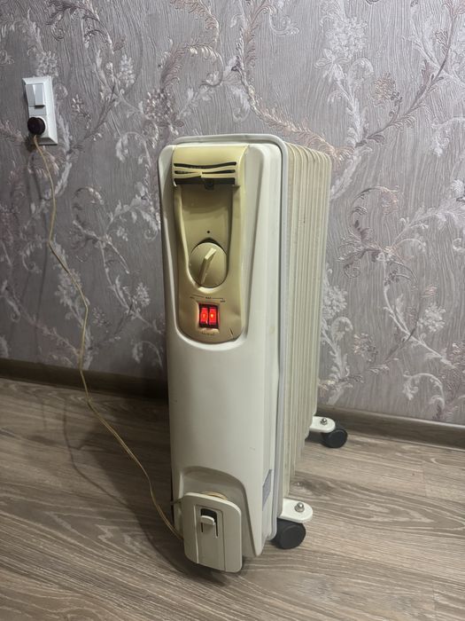 Масляный обогреватель.