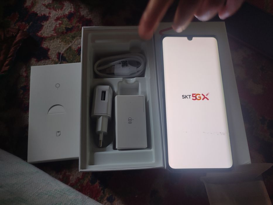 LG  телефон   5G  рассиядан  олиб   келинган  яанги  каропка  дакумт