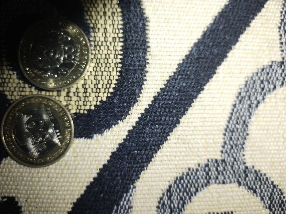 Продам коллекционные монеты 200,100тг