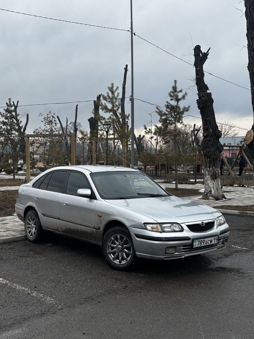 Мазда 626 птичка