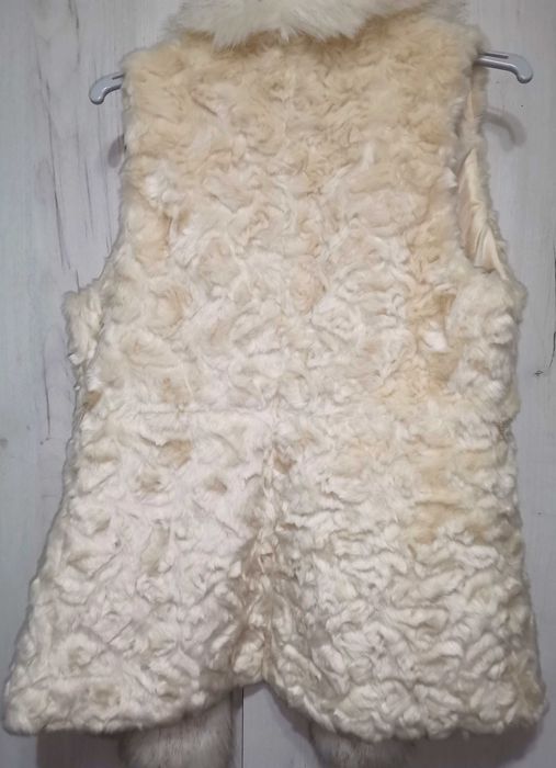 Vesta de blana, puf