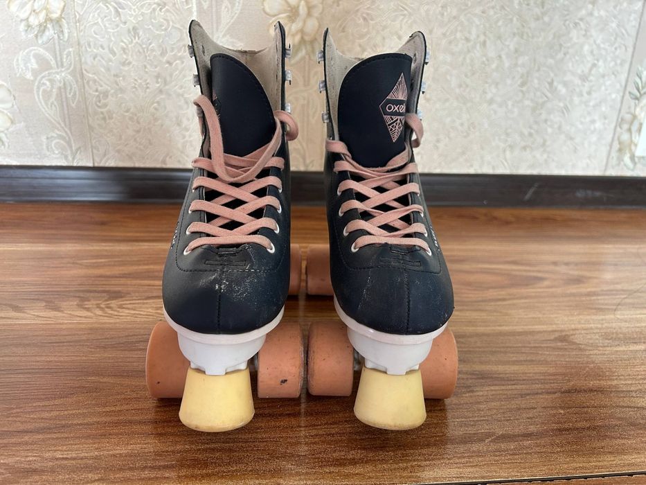 Роликовые коньки