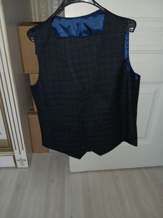 Продам новый костюм