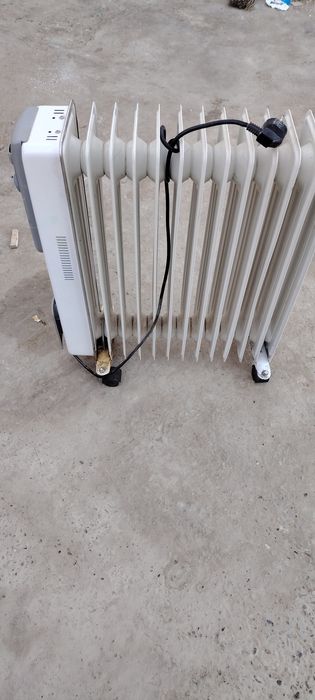 Электрическая.        обогреватель.