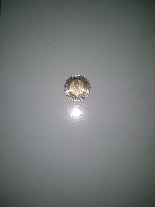 Продам Монеты 200 и 100 тг