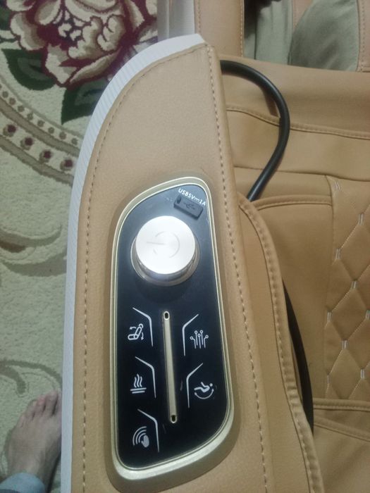 Массажный кресло