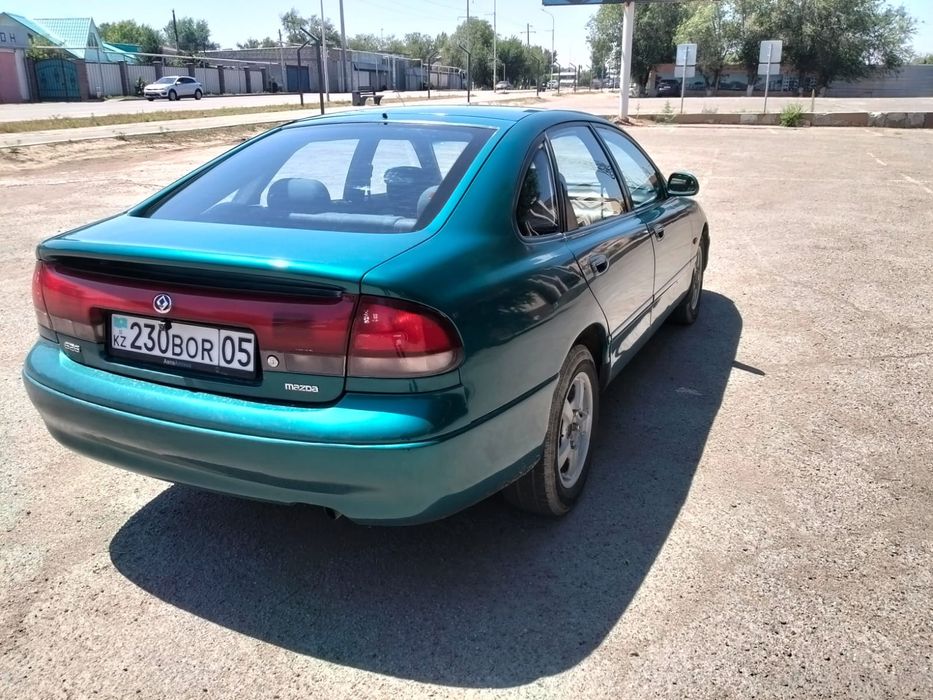 Мазда кронос 2.0