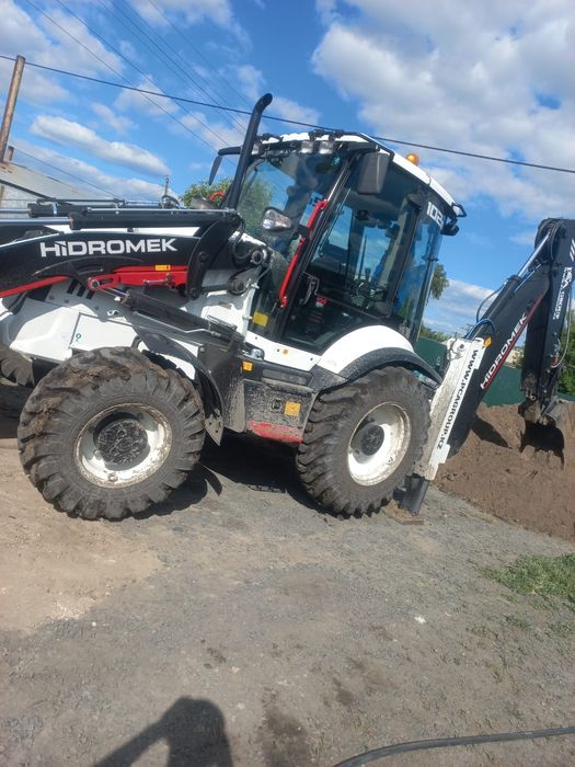 Эксковатор погрузчик 3в1