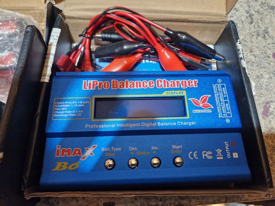 Set 2 baterii noi 6400ma si incarcator xmax