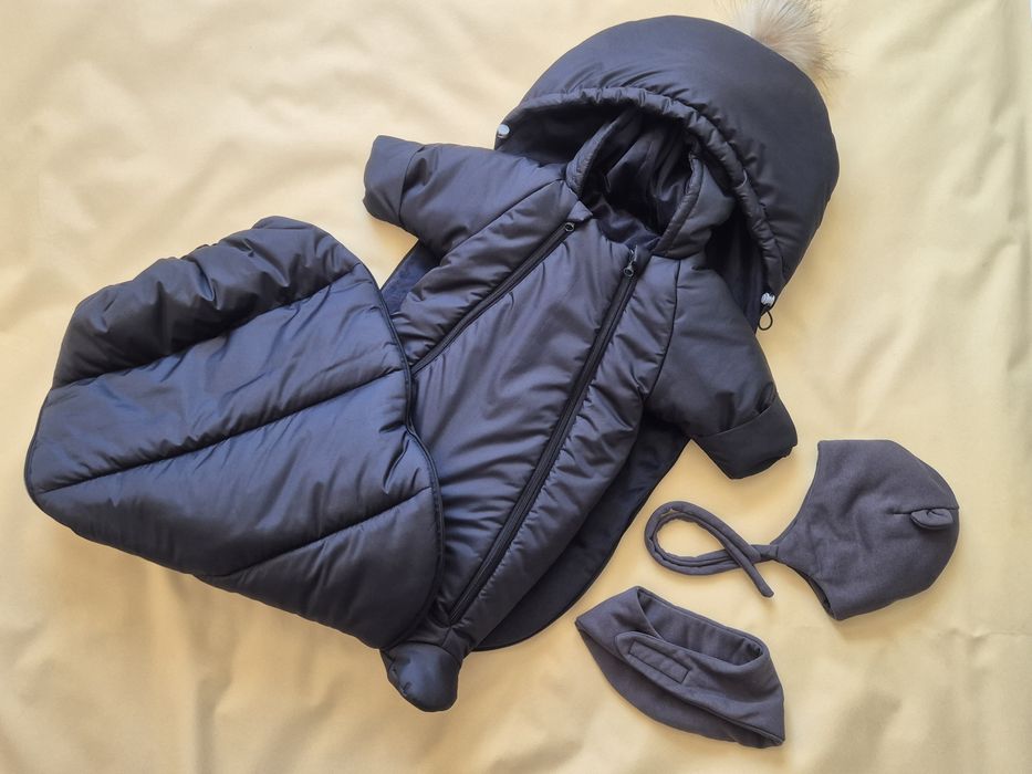 Продам новый комбинезон и конверт