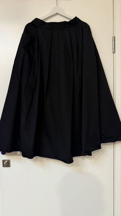 Юбки длины миди теплые