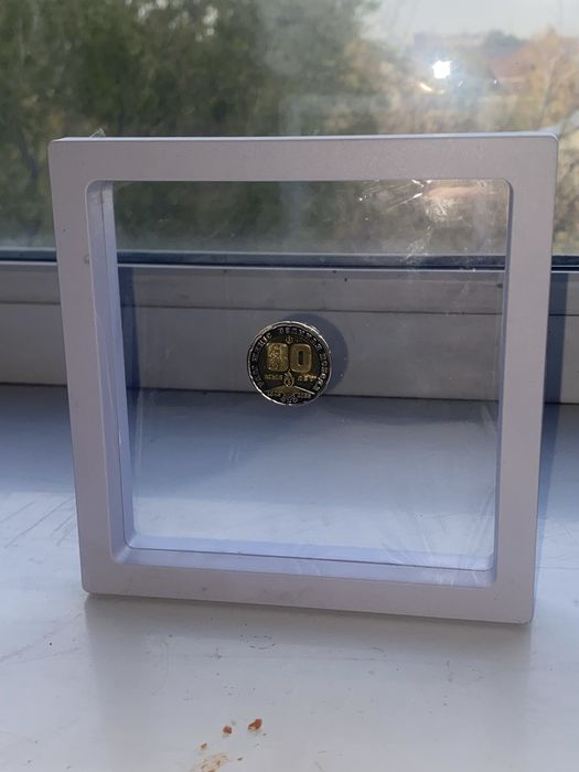 Продаю монета 80 лет 200 тенге