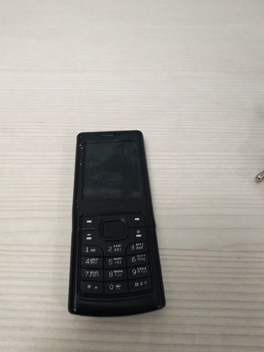 Телефон кнопочный