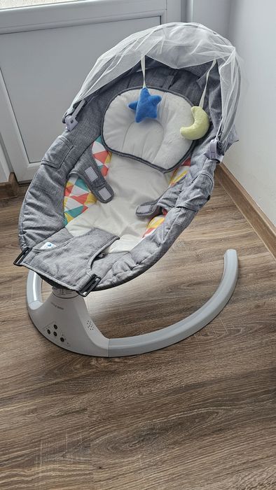 Balansoar electric pentru bebeluși Little Bird – cu copertină și jucării