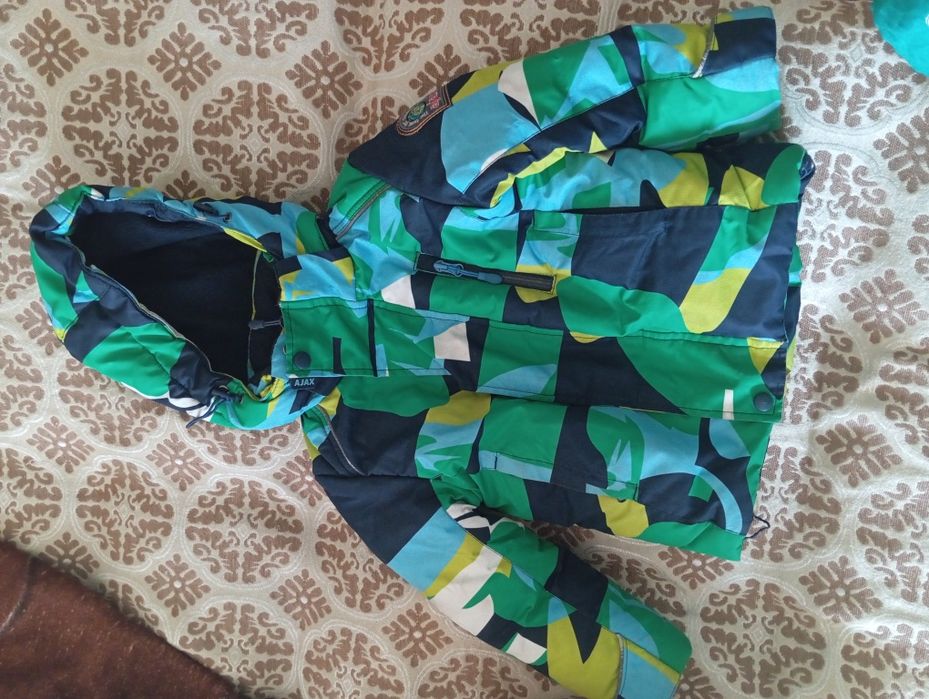 Продам зимний комбинезон детский