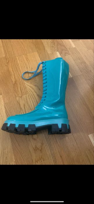 Высокие сапоги Prada